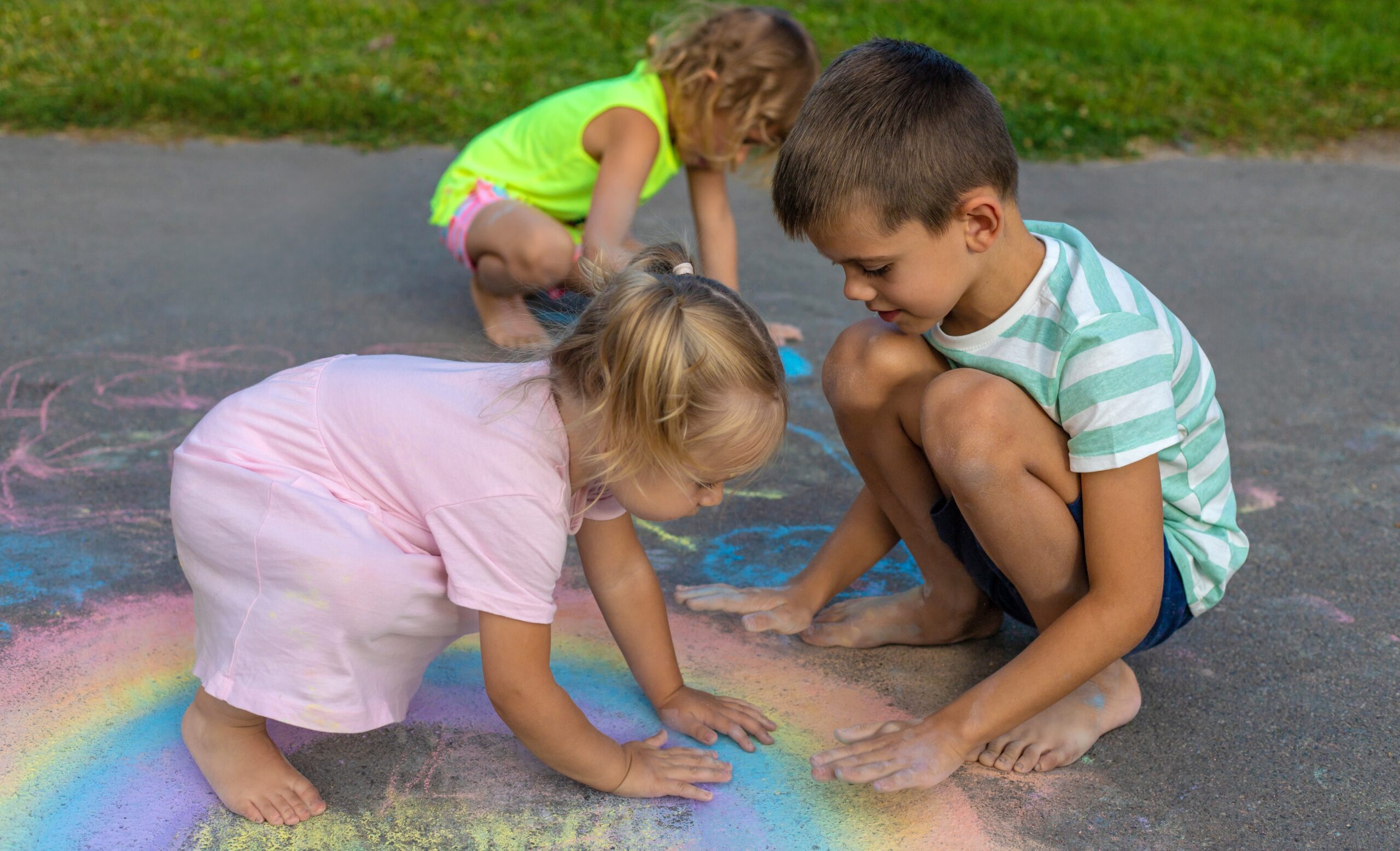 Children,Draw,With,Chalk,On,The,Asphalt ,A,Rainbow,,A